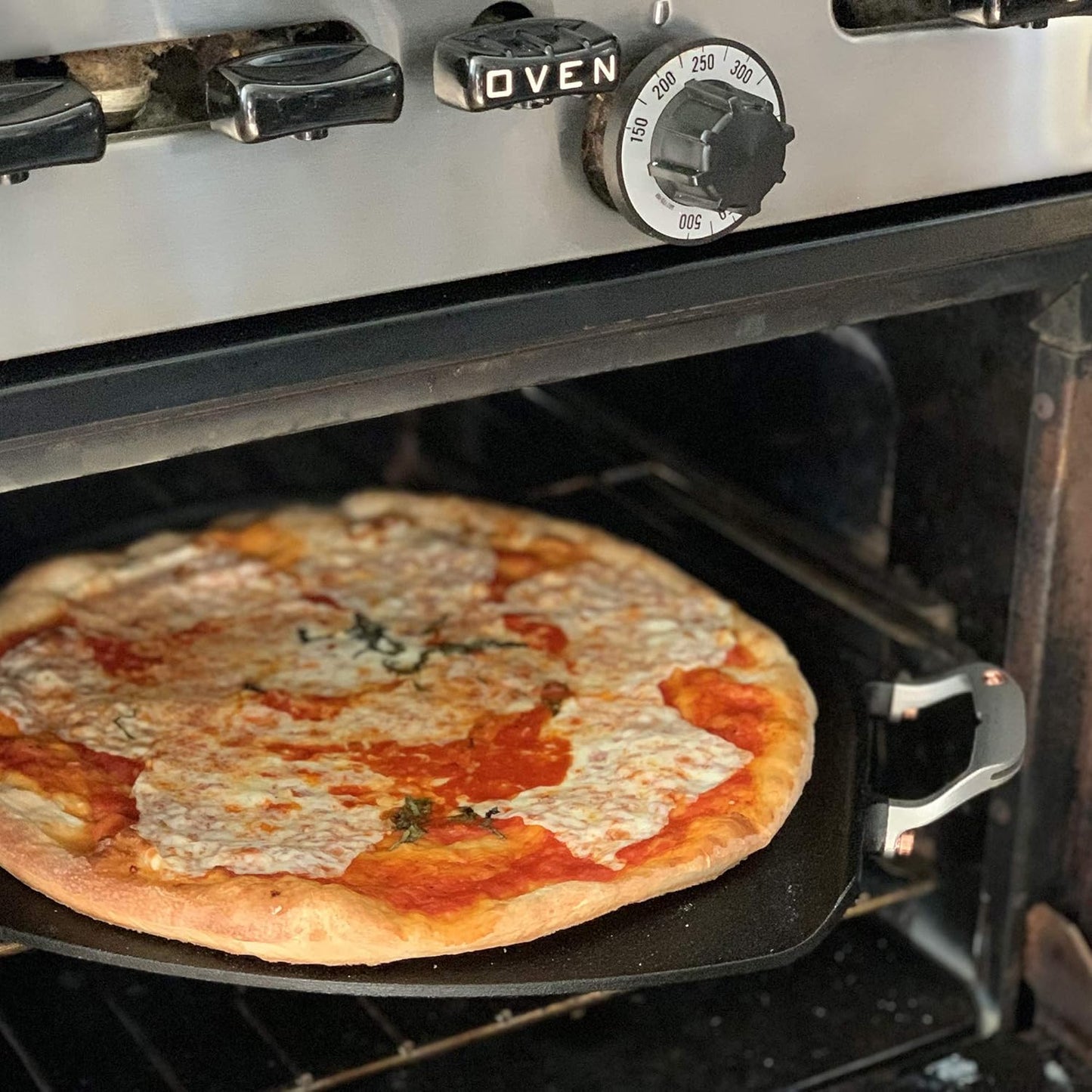 Outset Cast Iron Grill Skillet and Pan with Forged Handles for Pizza, Eggs, Pancakes, Burgers and Steaks, 14-inch, Black